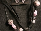 3-Strand Black suede leather
Leather cord w/ eclectic mix of beads
Large Rosaline Swarovski Crystal Heart
Sterling Silver Dragonfly
Pink Glass Ends
NSCLH1GM000013
SOLD!