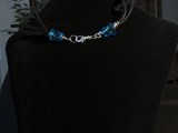 Lt. Sapphire Swarovski Crystal Necklace is tied together with blue glass ends & lobster claw closure.
S/N: NSCLH1GL00020
SOLD!