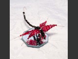 "Lady Siam"
Lt. Siam & Dk Siam Swarovski Crystal Dragonfly
Over 100 Sparkling Swarovski Crystals
Dragonfly rests on octagon mirror
SOLD!