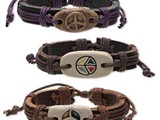 Leather Bracelets 
12mm wide with oval and rounded rectangle and peace sign, adjustable up to 10 inches with macramé knot closure. 
Available:  Contact Us
Limited Quantity!