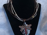 7-Stand Leather Rope Necklace
Copper Dragonfly
Siam Swarovski Crystal Tail
Dragonfly floats on Copper/Black Glass Leaf
SOLD!