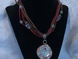 Dragonfly Necklace
Redline Marble puffed teardrop
Pewter etched Dragonfly w/Swarovski Crystal
5 strand suede leather necklace
SOLD!