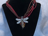 6-Strand Sued Leather
Silver Dragonfly with Topaz Swarovski Crystals
Over 100 crystals utilized in tail
Red/Gold Glass Leaf
SOLD!