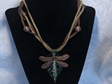 Copper Dragonfly
Peridot Swarovski Crystals
5-Strand Suede Leather
Green/Gold Glass Leaf
SOLD!