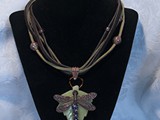Copper Dragonfly
Amethyst/Tanzanite Swarovski Crystals
5-Strand Suede Leather
Green Glass Leaf
SOLD!