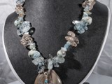 Sand & Sea Ocean Blue
Marble teardrop, aquamarine Swarovski & opal crystal, sesame jasper, hill tribes sterling & more!
S/N NSGTM3ZL00038
Available:  The Nest