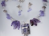 Sand & Sea Purple Haze Original
This is the sister to the original... although not as stunning as the original, it's still beautiful
Purple magnesite stone, Hill Tribes Sterling Silver, Swarovski Crystals, ice flake quartz, cultured pearl, and more...
SOLD!