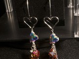 Sterling Silver Open Heart Earrings
Swarovski Crystal Hearts and beads and
dangling chains.
Available in multiple colors:
Siam, Amethyst, Peridot, Tanzanite, Sapphire, Astral Pink & More!
Limited Quantities
