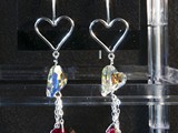 Sterling Silver Open Heart Earrings
Swarovski Crystal Hearts and beads and
dangling chains.
Available in multiple colors:
Siam, Amethyst, Peridot, Tanzanite, Sapphire, Astral Pink & More!
Limited Quantities
