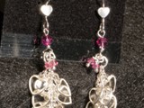 Rosaline Swarovski & Sterling Silver
Sterling heart fishhook earwires
Rosaline PInk Swarovski Crystal Hearts & beads
Silver plated clusters of hearts drop onto a Swarovski Crystal heart.
Limited Quantities
